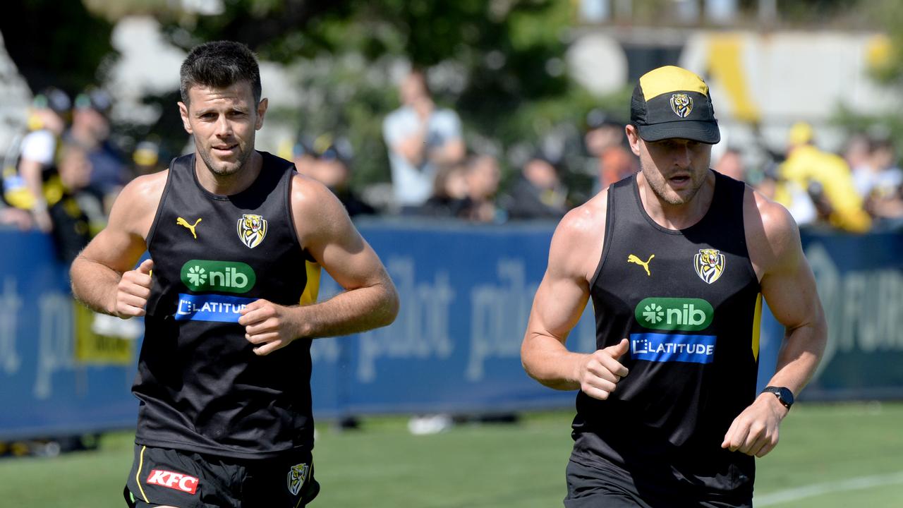 Trent Cotchin and Jacob Hopper at Richmond training at Punt Road Oval. Picture: Andrew Henshaw