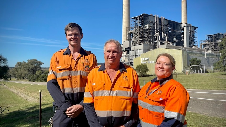 Three workers out the front of Liddell Power Station 